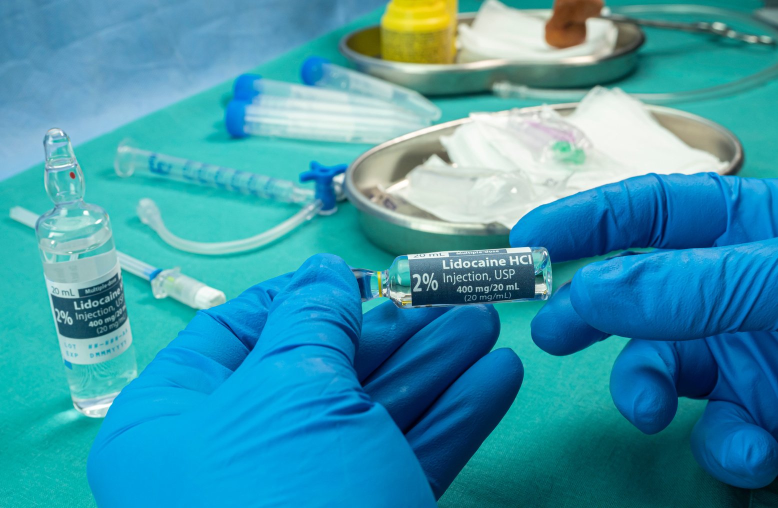 Nurse Holds Ampoule of Anesthesia